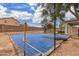 Backyard with basketball court and patio area at 42999 W Samuel Dr, Maricopa, AZ 85138