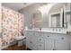 Shared bathroom with double vanity and shower/tub at 42999 W Samuel Dr, Maricopa, AZ 85138