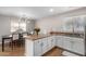 Bright kitchen with island and stainless steel appliances at 42999 W Samuel Dr, Maricopa, AZ 85138
