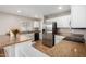 Spacious kitchen with stainless steel appliances and granite countertops at 42999 W Samuel Dr, Maricopa, AZ 85138