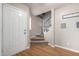Bright entryway with staircase and hardwood floors at 42999 W Samuel Dr, Maricopa, AZ 85138
