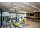 Relaxing community lounge with seating, TV, and pool view at 7300 E Earll Dr # 2021, Scottsdale, AZ 85251