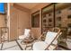 Relaxing balcony with wicker chairs and small table at 7300 E Earll Dr # 2021, Scottsdale, AZ 85251