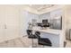 Modern kitchen with white cabinets and breakfast bar at 7300 E Earll Dr # 2021, Scottsdale, AZ 85251