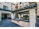 Community outdoor kitchen with grill and seating at 7300 E Earll Dr # 2021, Scottsdale, AZ 85251