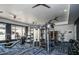 Well-equipped fitness center with various machines at 7300 E Earll Dr # 2021, Scottsdale, AZ 85251
