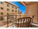 Private balcony with wicker chairs and city view at 7300 E Earll Dr # 2021, Scottsdale, AZ 85251