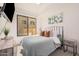 Cozy bedroom with a queen bed and city view at 7300 E Earll Dr # 2021, Scottsdale, AZ 85251