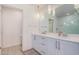 Modern bathroom with double vanity and a walk-in shower at 7300 E Earll Dr # 2021, Scottsdale, AZ 85251
