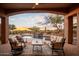 Peaceful backyard oasis with a pool and seating area, perfect for relaxation at 36482 N Boulder View Dr, Scottsdale, AZ 85262