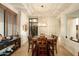 Bright dining room with hardwood floors and a wine cellar at 36482 N Boulder View Dr, Scottsdale, AZ 85262