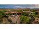 Home with a pool and desert landscaping, mountain views in the background at 36482 N Boulder View Dr, Scottsdale, AZ 85262