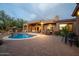 Spacious backyard with pool, patio, and outdoor seating at 36482 N Boulder View Dr, Scottsdale, AZ 85262