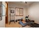 Home gym with various exercise equipment including rower and weights at 36482 N Boulder View Dr, Scottsdale, AZ 85262