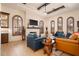 Spacious living room with hardwood floors, fireplace, and comfortable seating at 36482 N Boulder View Dr, Scottsdale, AZ 85262