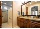 Double vanity bathroom with granite countertop and separate shower at 36482 N Boulder View Dr, Scottsdale, AZ 85262