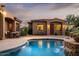 Stunning pool area with water feature and adjacent casita at 36482 N Boulder View Dr, Scottsdale, AZ 85262