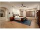 Bright and airy main bedroom with hardwood floors and a spacious layout at 36482 N Boulder View Dr, Scottsdale, AZ 85262