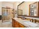 Elegant bathroom with double vanity, granite countertop, and shower at 36482 N Boulder View Dr, Scottsdale, AZ 85262