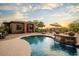 Relaxing pool with waterfall feature and expansive desert views at 36482 N Boulder View Dr, Scottsdale, AZ 85262