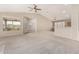 Spacious living room with high ceilings and a view to the backyard at 6599 E Casa De Leon Ln, Gold Canyon, AZ 85118