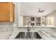 Kitchen features a large double sink with a modern faucet at 6599 E Casa De Leon Ln, Gold Canyon, AZ 85118