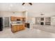 Kitchen with an island and views into the living room at 6599 E Casa De Leon Ln, Gold Canyon, AZ 85118