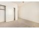 Well-lit bedroom with a large closet and neutral tones at 6599 E Casa De Leon Ln, Gold Canyon, AZ 85118