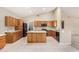 Open kitchen with granite countertops and stainless steel appliances at 6599 E Casa De Leon Ln, Gold Canyon, AZ 85118
