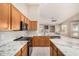 Spacious kitchen featuring granite countertops and stainless steel appliances at 6599 E Casa De Leon Ln, Gold Canyon, AZ 85118