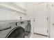 Laundry room with LG washer and dryer, and cabinets at 6599 E Casa De Leon Ln, Gold Canyon, AZ 85118