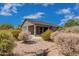 Landscaped backyard with gravel and desert plants at 6599 E Casa De Leon Ln, Gold Canyon, AZ 85118