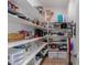 Well-organized pantry with ample shelving for storage at 33632 N Rifleman Rd, Cave Creek, AZ 85331