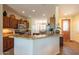 Well-equipped kitchen with granite countertops and island at 20340 N Canyon Whisper Dr, Surprise, AZ 85387