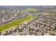 Aerial view of community with golf course and residential homes at 20340 N Canyon Whisper Dr, Surprise, AZ 85387