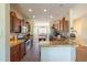 Kitchen boasts granite countertops and ample cabinetry at 20340 N Canyon Whisper Dr, Surprise, AZ 85387