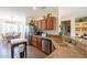 Spacious kitchen with granite countertops, stainless steel appliances, and ample cabinetry at 20340 N Canyon Whisper Dr, Surprise, AZ 85387