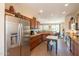Kitchen boasts stainless steel appliances and granite countertops at 20340 N Canyon Whisper Dr, Surprise, AZ 85387