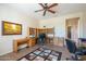 Home office with built-in shelving and two work stations at 20340 N Canyon Whisper Dr, Surprise, AZ 85387