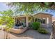 Relaxing covered patio with seating area, perfect for outdoor dining and entertaining at 20340 N Canyon Whisper Dr, Surprise, AZ 85387