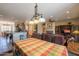 Open dining area with adjacent kitchen and Gathering room at 20340 N Canyon Whisper Dr, Surprise, AZ 85387