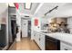 White kitchen with stainless steel appliances and ample counter space at 3425 W Acoma Dr, Phoenix, AZ 85053