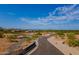 Aerial view of a new community with paved roads and desert landscaping at 10610 E Stoney Cir, Scottsdale, AZ 85262