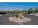 Landscaped entrance to a new community with cacti and stone accents at 10610 E Stoney Cir, Scottsdale, AZ 85262