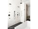 Modern bathroom with walk-in shower and double shower heads at 10610 E Stoney Cir, Scottsdale, AZ 85262