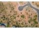 Aerial view of a new luxury home lot with desert landscaping at 10610 E Stoney Cir, Scottsdale, AZ 85262