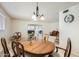 Bright dining area with a large table and built-in hutch at 13605 N Redwood Dr, Sun City, AZ 85351