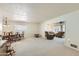 Open concept dining room with views into the living room at 13605 N Redwood Dr, Sun City, AZ 85351