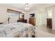 Bedroom with a double bed, dresser, and plenty of closet space at 13605 N Redwood Dr, Sun City, AZ 85351