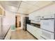 Bright kitchen features white cabinets, ample counter space, and modern appliances at 13605 N Redwood Dr, Sun City, AZ 85351